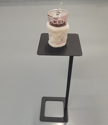 Small metal side table for patio use